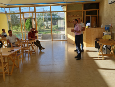 A hands-on workshop took place featuring an innovative beehive, during which Vladimir Hovsepyan, the representative of Haterk Food, provided a comprehensive explanation of the benefits associated with this particular beehive structure.